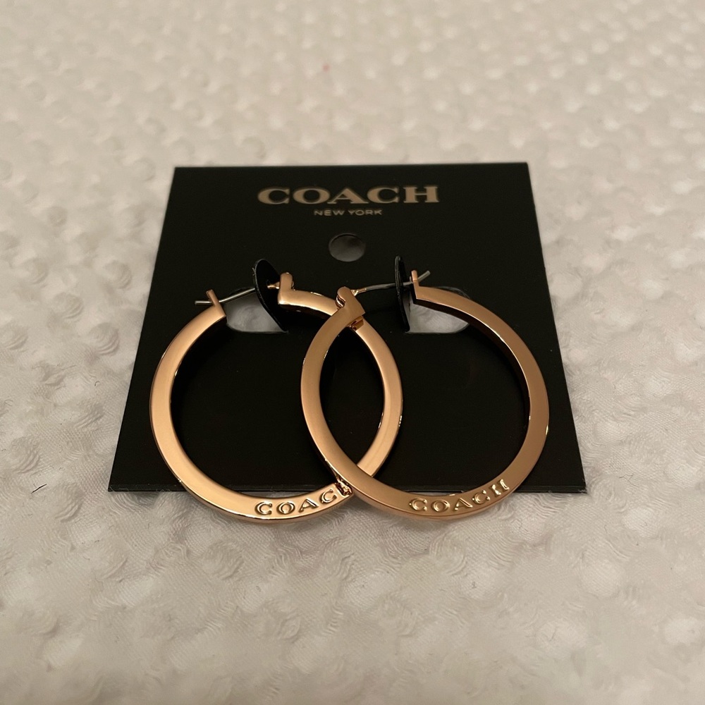 NWT Coach Hoop Earrings in Rose Gold